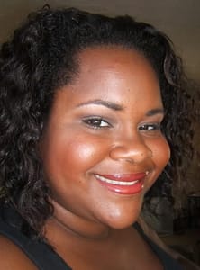 Dark Skinned Woman Wears MAC Hot Tahiti Lipstick